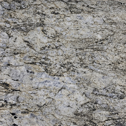 Blue Dunes granite slab with flowing black veins across a light gray and beige surface.