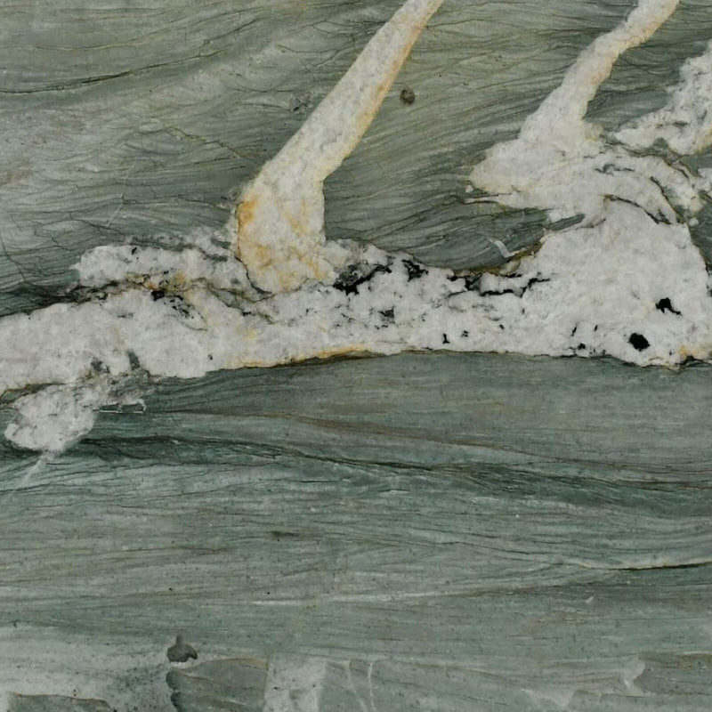 Close-up of SLAB3QTE Crystal Jungle 3cm polished quartzite slab with flowing green-gray bands and a wide white crystalline vein.