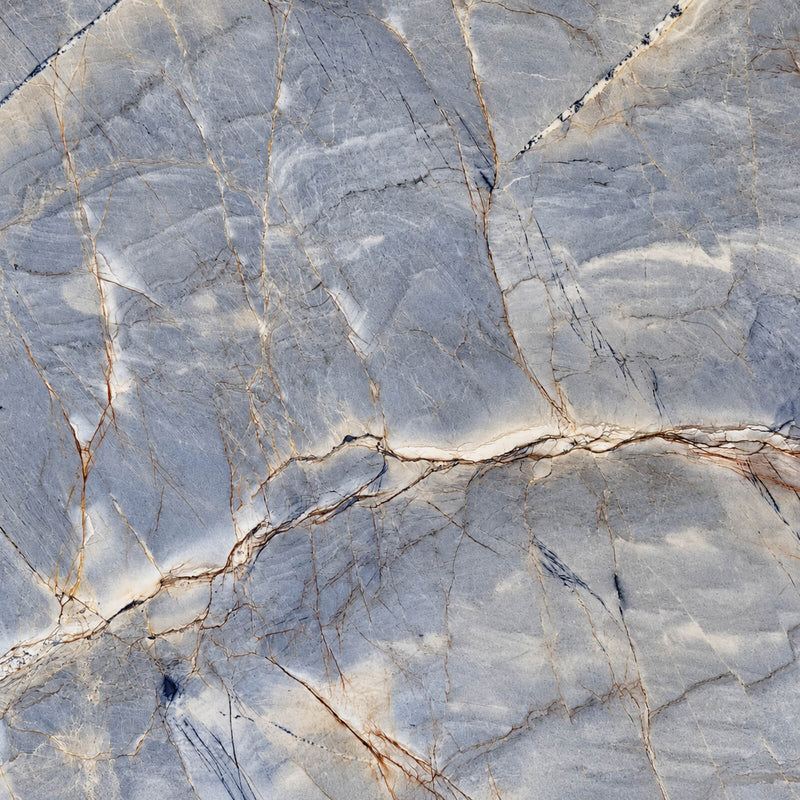 Mystic Blue 3cm polished quartzite slab with blue-gray tones, cream veins and fine brown veining.
