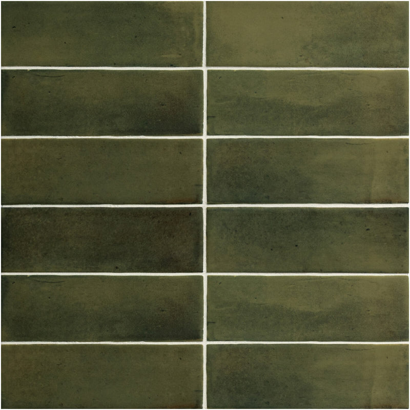 Soco Green matte porcelain tiles with deep olive green shading, subtle surface mottling and softly irregular edges, arranged in straight horizontal rows.