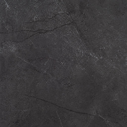 Close-up of St. Croix Flint 12x24 porcelain tile showing its charcoal-gray surface and subtle stone-look veining.
