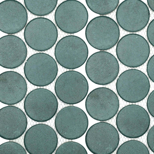 Stage Penny Denim 2x2 natural ceramic mosaic with blue-gray round tiles and white mesh backing.