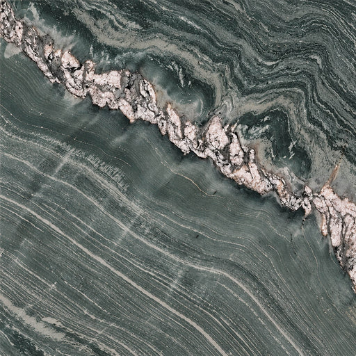 Stella Maestro polished quartzite with dark green flowing layers and a diagonal pale crystalline vein.