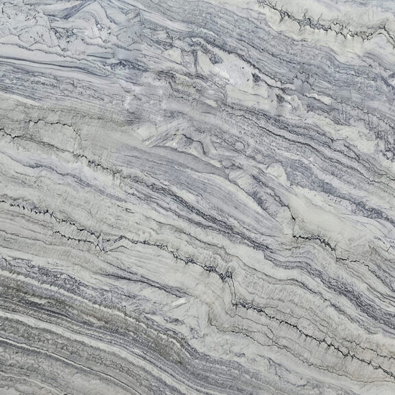 Stratus Blue quartzite with flowing blue-gray and white bands and fine dark veins.