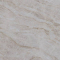Close-up of Taj Mahal quartzite with a cream background and subtle beige veining.
