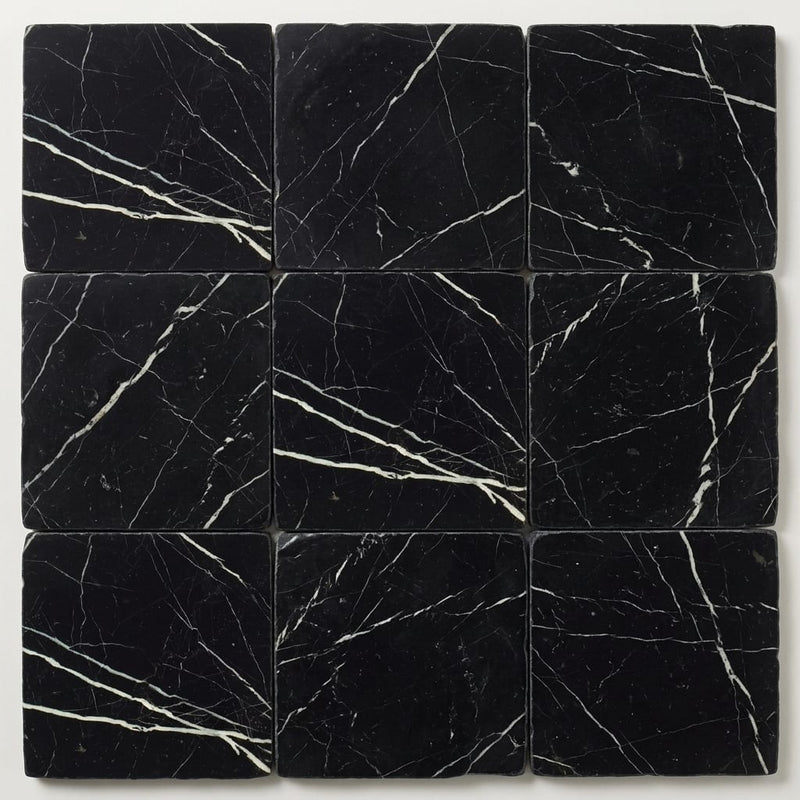 Taurus Black Marble Tile 12x12 Tumbled close-up