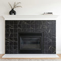 Taurus Black Marble Tile 6x6 Tumbled — Living Room fireplace surround