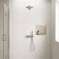 Terrazzo White 24x24 Porcelain Tile — Bathroom shower wall