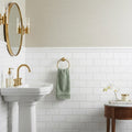 Thassos White (Greek) Marble 3x6 Tumbled Tile — Powder Room wainscot