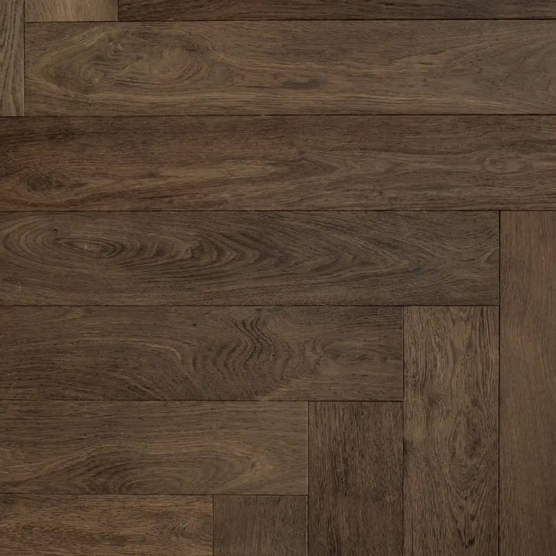 Timbertop Treviso 4x33 engineered European oak flooring with rich brown tones and natural wood grain in a herringbone pattern.