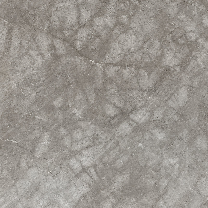 Tundra Grey marble slab with a cloudy gray surface and subtle natural veining.