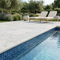 Tundra Marble Leather (Sandblasted & Brushed) 12 x 24 x 1.25 Double Bullnose Coping 12x24 pool coping — Swimming Pool remodel pool edge