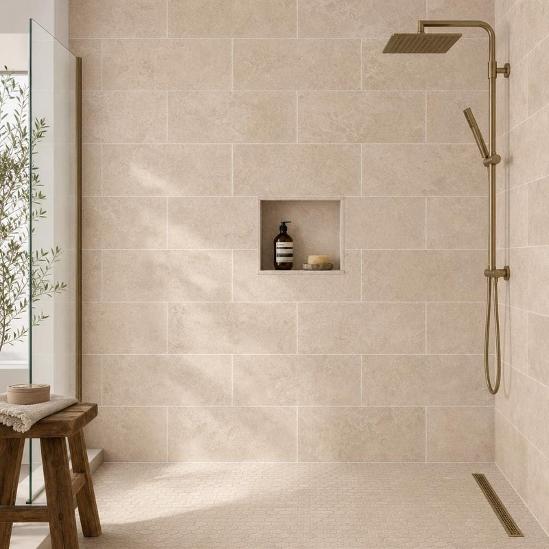 Tuscany Platinum 12x24 Honed Travertine Tile — Bathroom shower wall