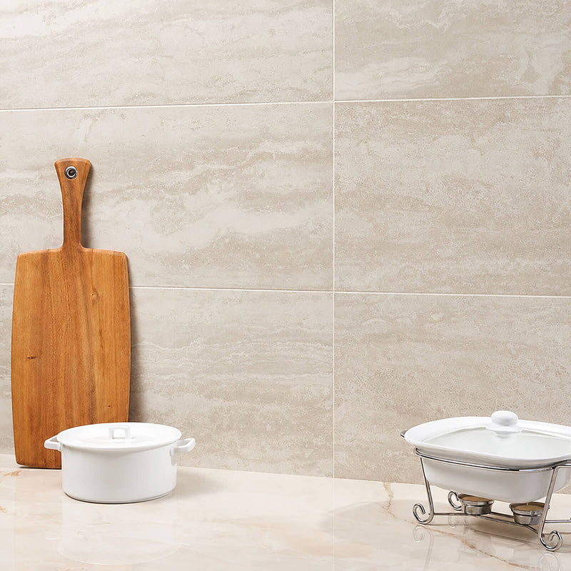 UNICOM Select Cream 12x24 matte porcelain tile kitchen backsplash with soft cream tones and stone-look texture.