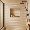 Valencia Travertine 1x2 Tumbled Travertine Diamond / Rhomboid Mosaic — Bathroom shower wall