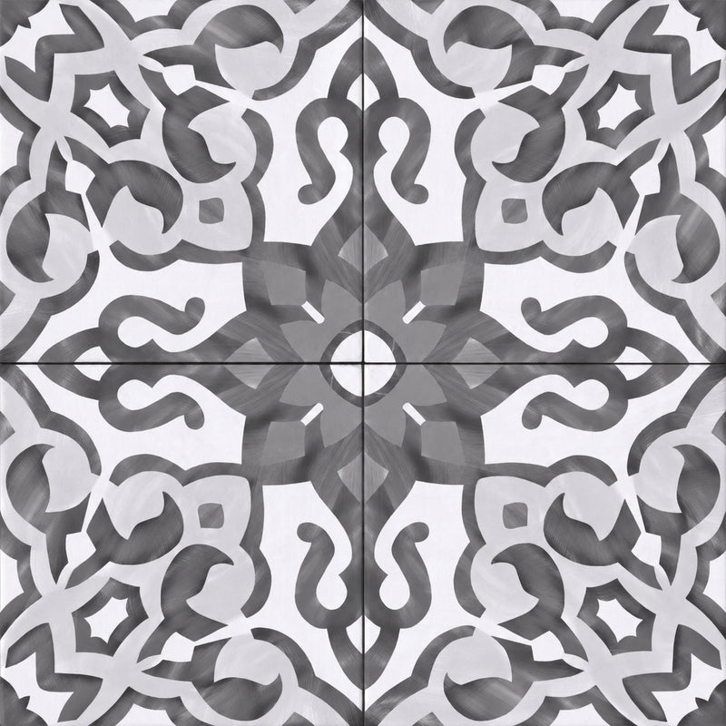 Villa Azul Giardino Black 10x10 matte ceramic tiles with gray and white ornamental patterns surrounding a dark central motif.