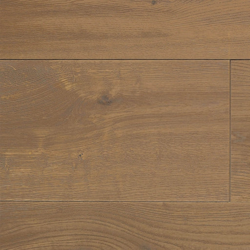 Villa Caprisi Brindisi European oak engineered hardwood planks with warm honey brown coloring, visible natural grain and knots, and a staggered floor arrangement.