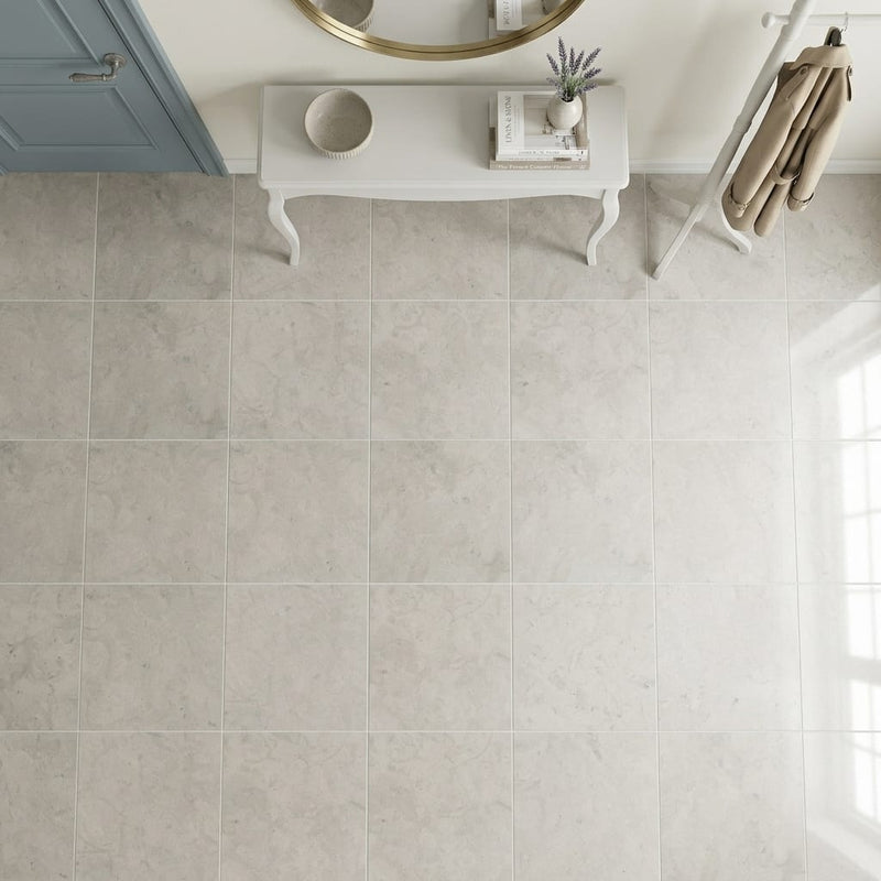 Volcanic Gray Limestone Tile 24x24 Honed 5/8 inch — Foyer floor