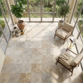 Walnut Filled Honed 18x18 Travertine Tile — Sunroom floor