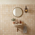 Walnut Travertine 2x2 Tumbled Travertine Mosaic — Powder Room wall