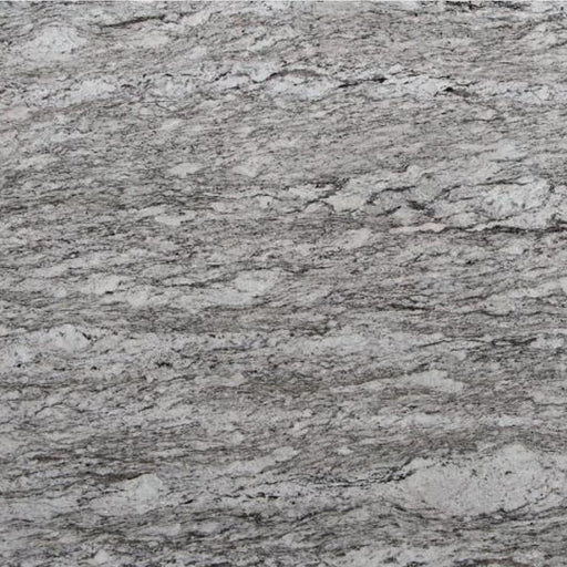 White Alamo polished granite with a light gray background and flowing dark gray veining.