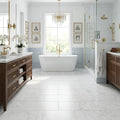 White Carrara 12x24 Honed Marble Tile — Primary Bath floor