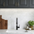 White Carrara 3x12 Honed Marble Tile — Kitchen backsplash