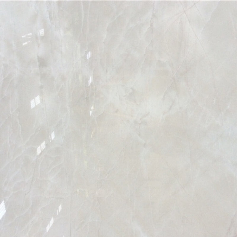Close-up of Zurich polished quartzite with a pale white-gray surface and subtle natural veining.
