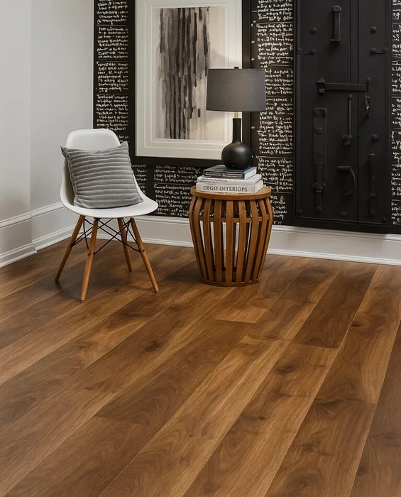 Acacia flooring, streaked caramel-to-espresso, delivers exotic depth to a boho loft, its lively contrast anchoring rattan furniture, patterned rugs, and potted greenery.

